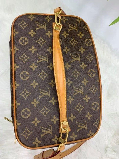 Cloth travel bag Louis Vuitton Brown in Cloth - 34061929